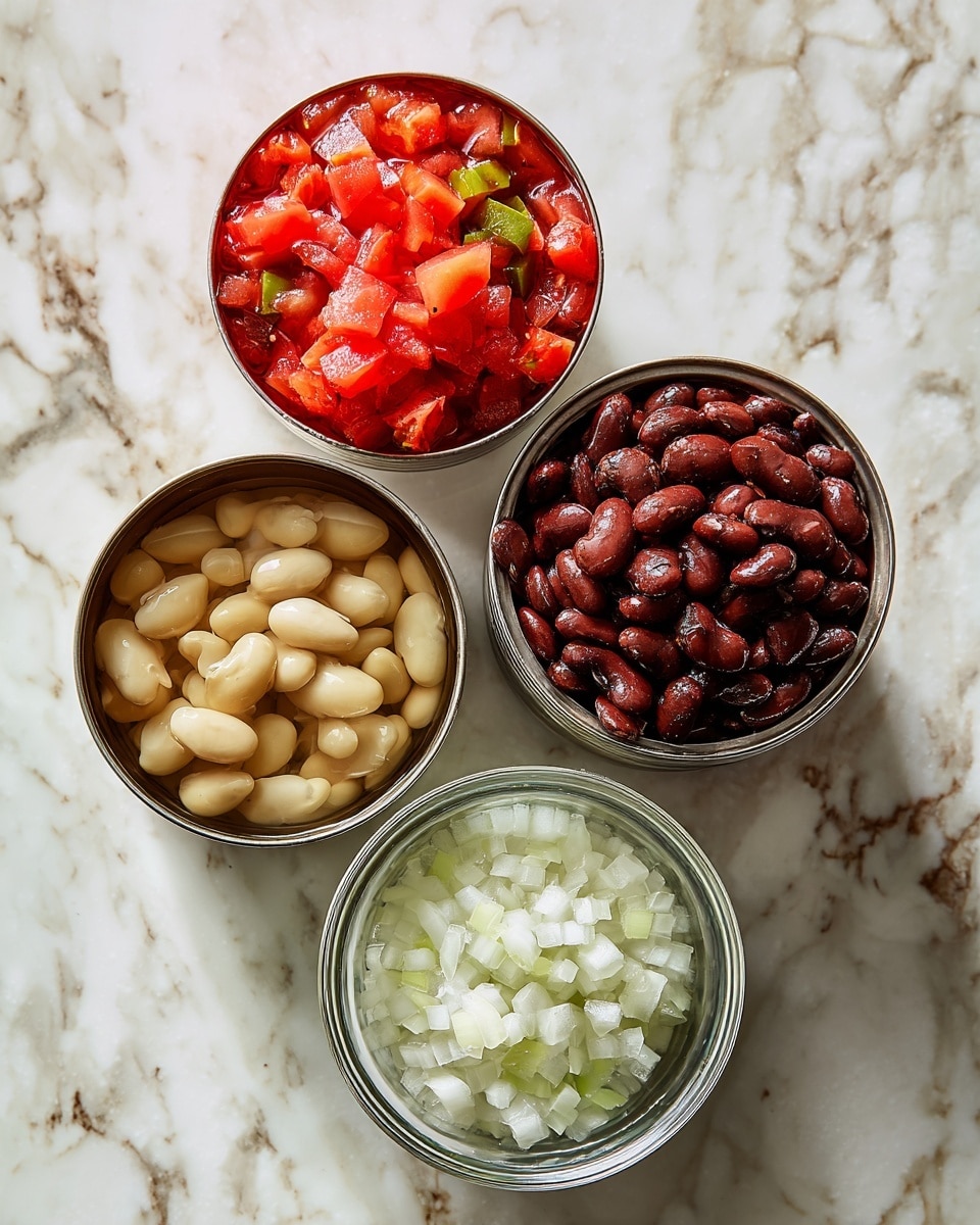The image shows four containers on a white marbled surface. Three cans without labels hold different foods: the top can has diced red and green tomatoes with a glossy texture, the left can contains pale yellow beans in water, and the right can is filled with dark brown beans with a shiny, wet look. Below these, there is a clear glass bowl with finely chopped white onions that look fresh and crisp. The arrangement forms a triangular shape with the bowl at the bottom center. Photo taken with an iphone --ar 4:5 --v 7