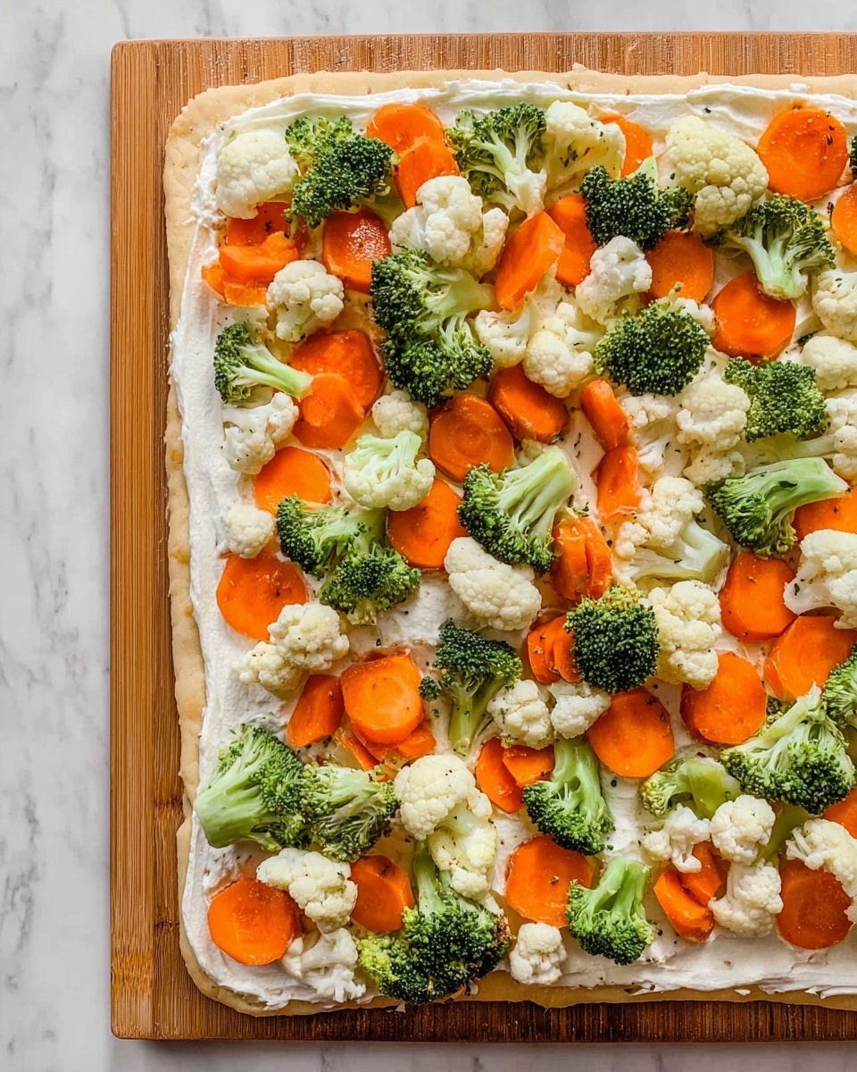 A rectangular flatbread sits on a wooden board placed on a white marbled surface. The flatbread has a smooth, thick white creamy spread evenly covering the top layer. On top of this spread is a colorful mix of fresh vegetable pieces: bright orange carrot slices, small green broccoli florets, and white cauliflower florets scattered densely across the entire surface. The vegetables are fresh, crisp, and vibrant, creating a visually appealing and healthy look. Photo taken with an iphone --ar 4:5 --v 7