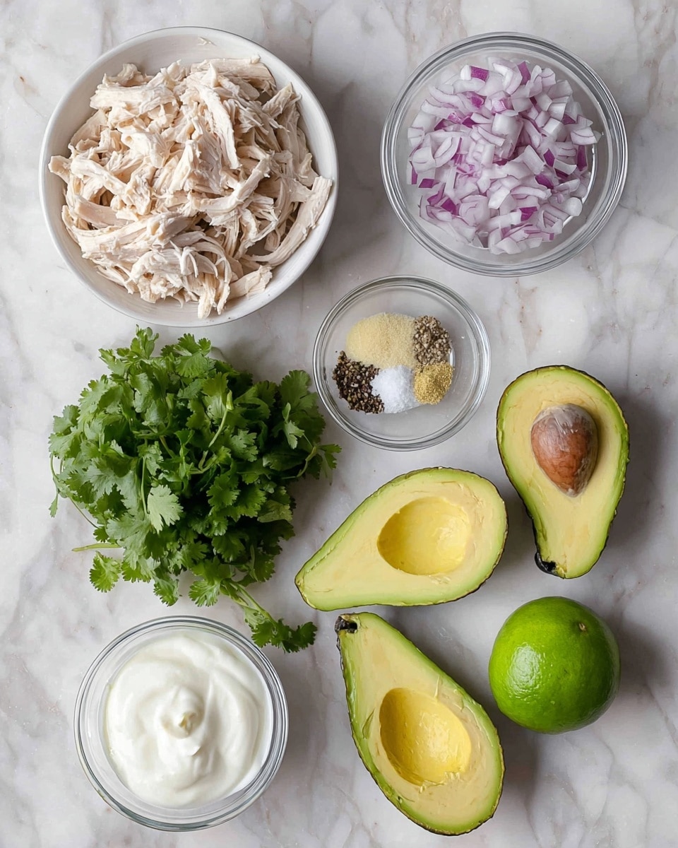 The image shows ingredients neatly placed on a white marbled surface. On the left side, there is a white bowl filled with shredded light beige chicken. To its right, there is a clear glass bowl with finely chopped purple and white onions. Below the onions, two smaller clear glass bowls contain a pale yellow powder and a mix of black pepper and white salt. Moving downward, a bunch of bright green cilantro leaves lies next to three halves of ripe avocados, their yellow-green flesh visible, two of which have brown seeds and two without. In the bottom left corner, another clear glass bowl contains smooth white sour cream. Two halved green limes are in the middle right side. The lighting is natural and clear, and the photo taken with an iphone --ar 4:5 --v 7