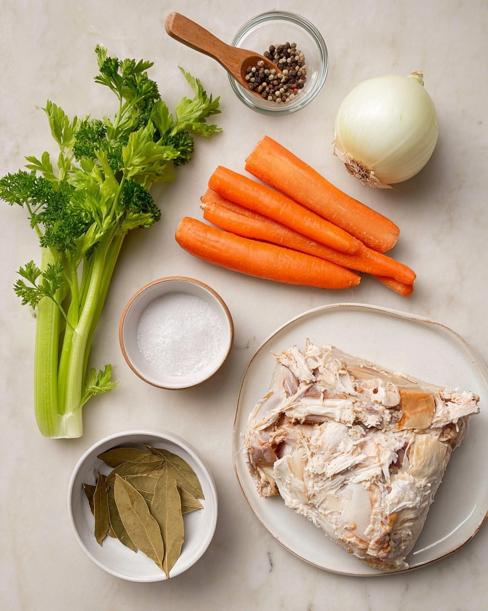 The image shows a white plate in the bottom right corner with a large piece of cooked chicken carcass that has a mix of white and light brown cooked meat with visible bone structure. To the top right, there is a whole white onion with smooth texture. Near the center right are three orange carrots, slightly rough and unpeeled, laid side by side. On the left, a bunch of fresh green celery stalks with leafy tops lies diagonally. A small white bowl containing several dried bay leaves sits at the bottom left. Above that, a wooden spoon with mixed whole peppercorns rests in the middle. At the top left, a glass bowl holds white salt granules. A small sprig of curly parsley is placed near the bottom left corner. The background is a white marbled surface. photo taken with an iphone --ar 4:5 --v 7
