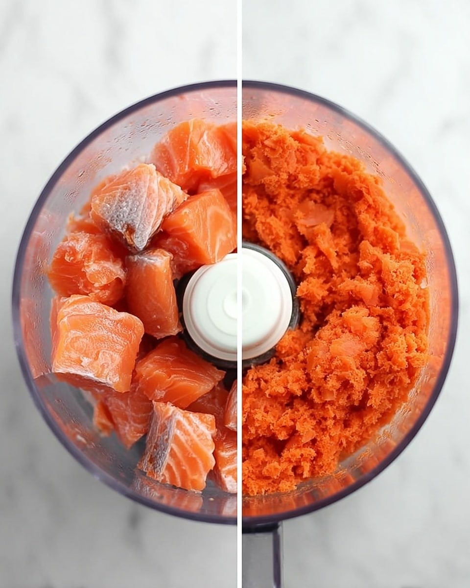 The image is a side-by-side collage showing two views of a white food processor on a white marbled surface. The left side shows the food processor filled with thick, uneven chunks of raw orange salmon with some pieces showing slightly darker skin patches, giving a fresh and textured look. The right side shows the same food processor with the salmon ground into a finely chopped, softer orange mixture with a smooth, moist texture. The photo is clear and bright, focusing on the detail of the salmon in the processor. Photo taken with an iphone --ar 4:5 --v 7