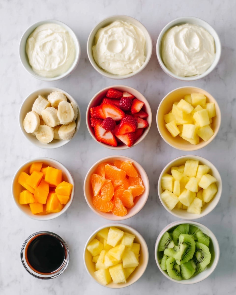 The image shows twelve small white bowls arranged in neat rows on a white marbled surface. Each bowl holds a different ingredient: three bowls contain creamy white substances with smooth textures, while the others hold various chopped fruits including bright red strawberries, pale yellow banana slices, orange cantaloupe cubes, yellow pineapple chunks, orange mandarin segments, green kiwi pieces, and yellow mango cubes. One small bowl at the bottom left contains a dark liquid, likely vanilla extract. The colors are vibrant and fresh, and the bowls are evenly spaced to create a clean and organized look photo taken with an iphone --ar 4:5 --v 7