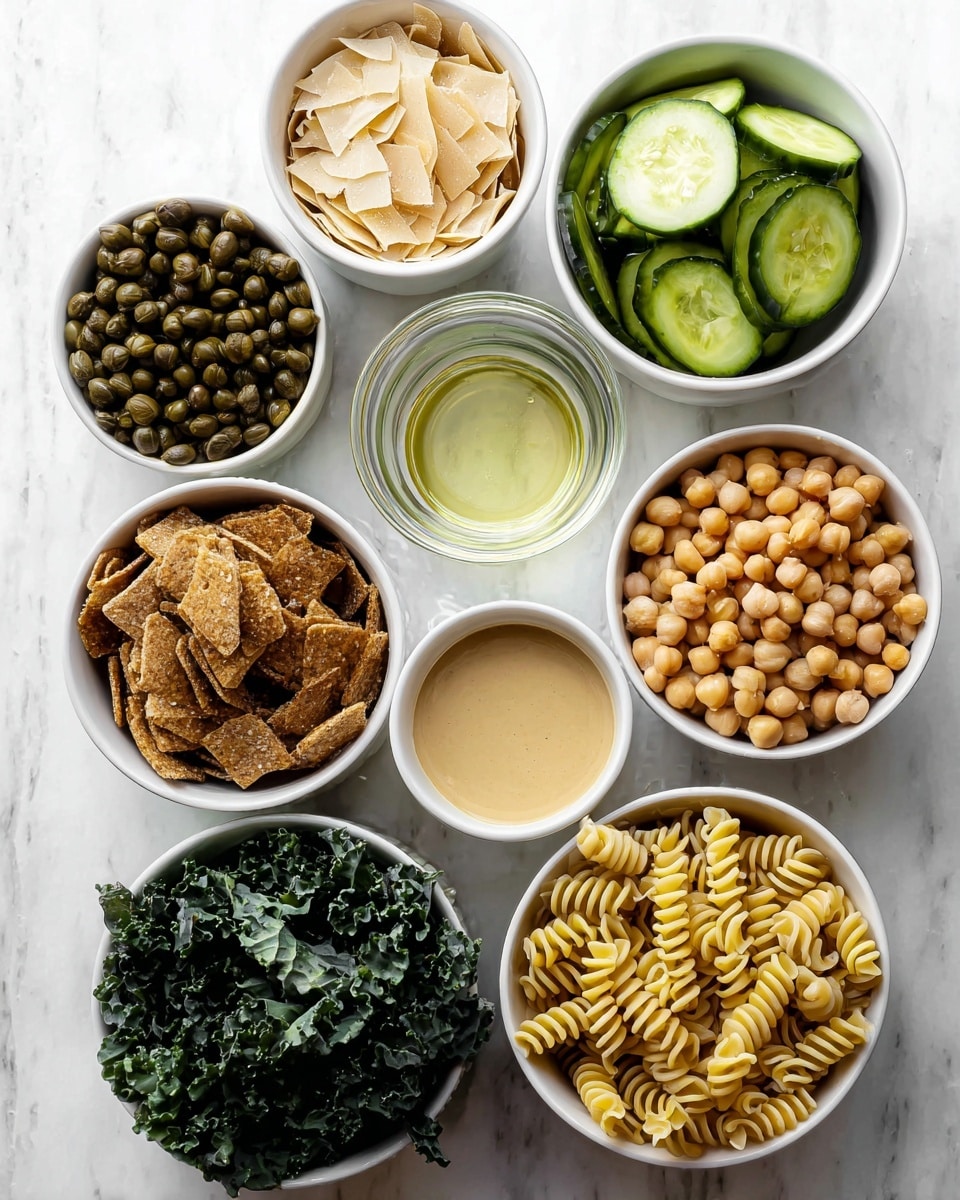 The image shows nine small white bowls arranged on a white marbled surface. Starting from the top left, there is a bowl of small dark green capers, next to it is a bowl filled with light beige thin, flat flakes. Below the capers is a small transparent bowl with a clear light liquid, followed by a bowl of half-moon sliced cucumbers with dark green skin and light green inside. To the right, a bowl of round, light brown chickpeas sits next to a small glass bowl with yellow olive oil. Below the chickpeas is a bowl full of crispy, brown croutons, and below the clear liquid is a bowl with smooth beige-colored sauce. At the bottom left is a bowl filled with dark green curly kale, and to the right is a bowl of spiral-shaped cooked pasta in a pale yellow color. Photo taken with an iphone --ar 4:5 --v 7