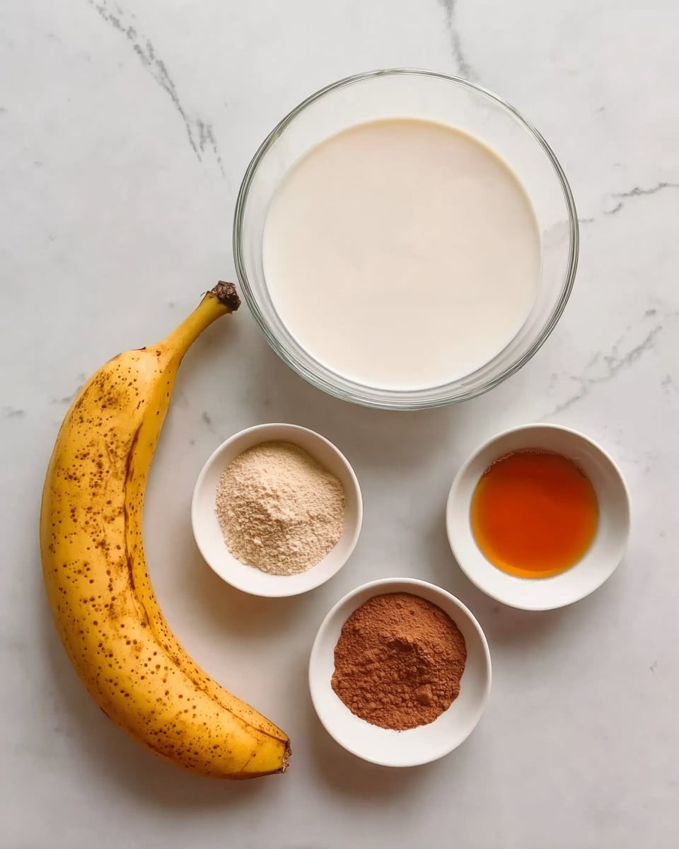 The image shows five ingredients placed on a white marbled surface: a large clear glass bowl filled with white liquid, a ripe yellow banana with brown spots beside it, a small white bowl of light brown powder, another small white bowl of a darker brown powder, and a third small white bowl filled with a clear amber liquid. photo taken with an iphone --ar 4:5 --v 7