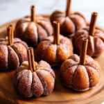 Pumpkin Donuts with Pumpkin-Shaped Indentations and Cinnamon-Sugar Coating Recipe