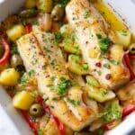 Portuguese Bacalhau com Batatas: Traditional Salt Cod Bake with Potatoes, Vegetables, and Olives Recipe